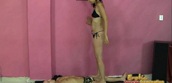  Cute domme trampling her slave into submission
